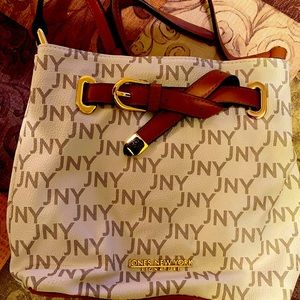 Jones New York Signature. White background with JNY logos throughout fabric
